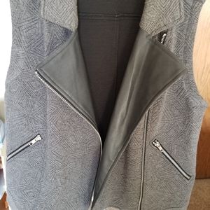 Gray vest with black faux letter lapels.